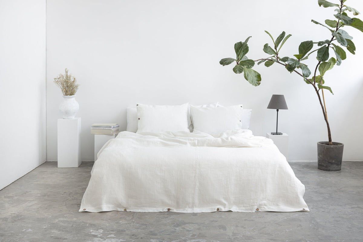 White linen bedding set with coconut buttons