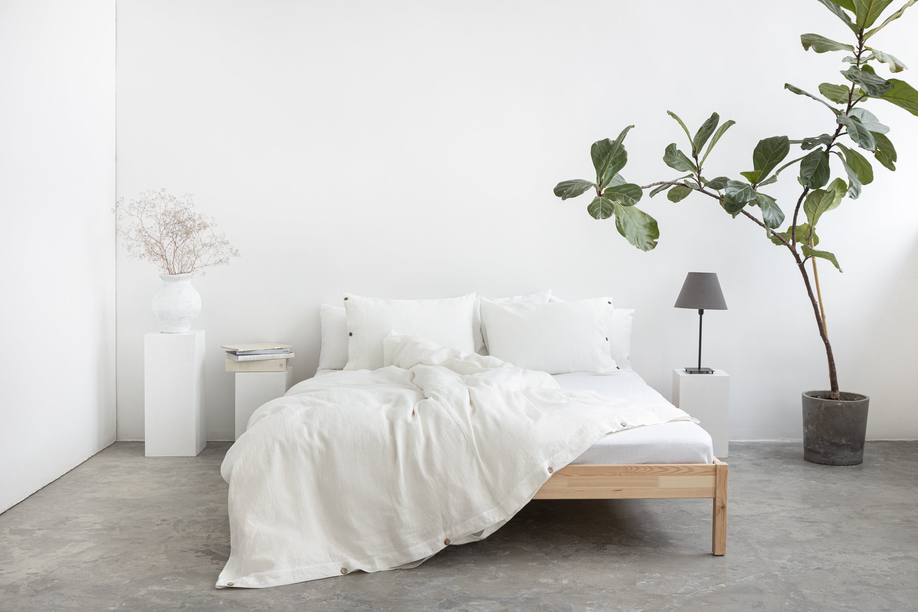 White linen pillowcase with coconut buttons