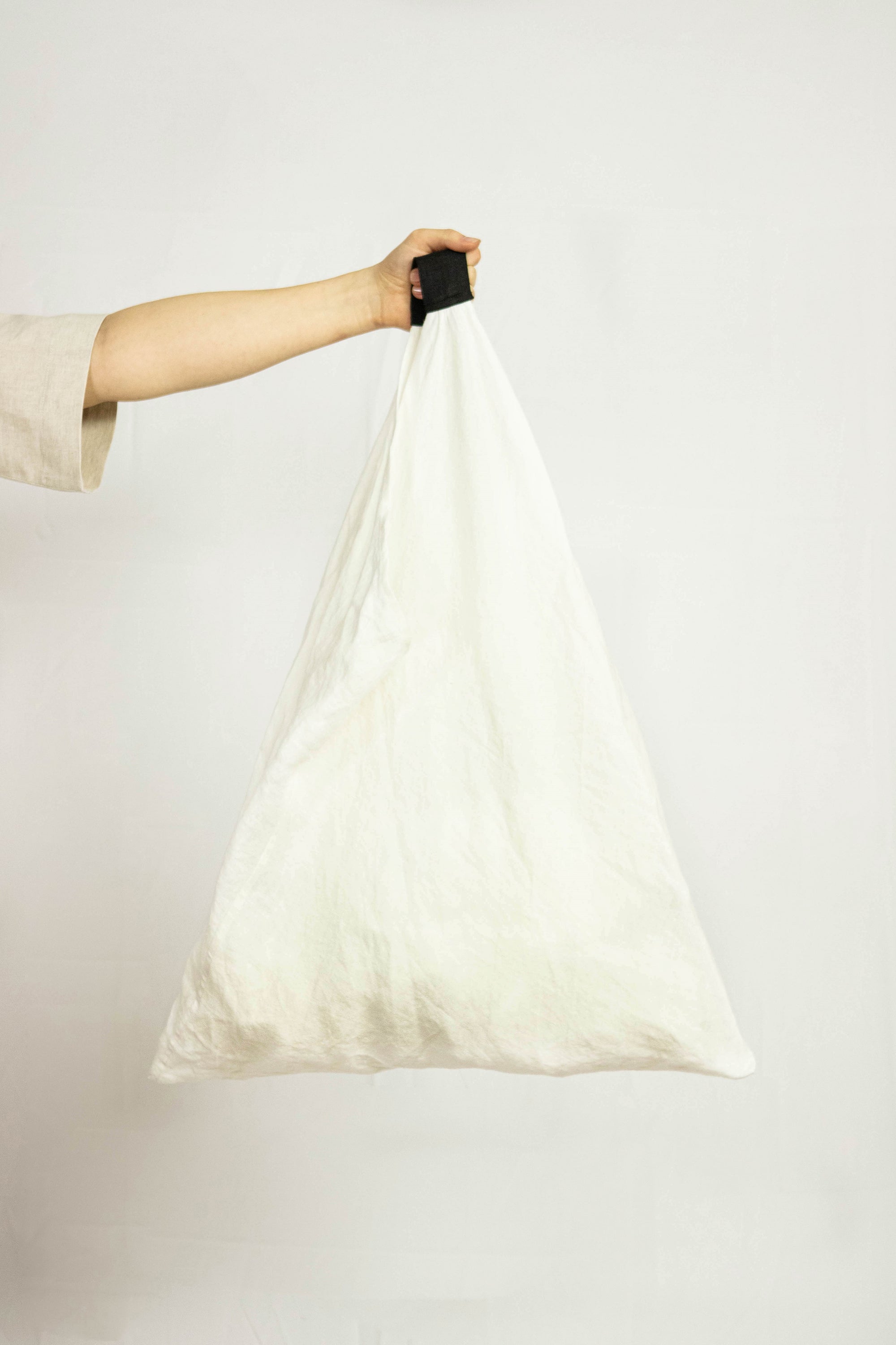 White linen triangle bag