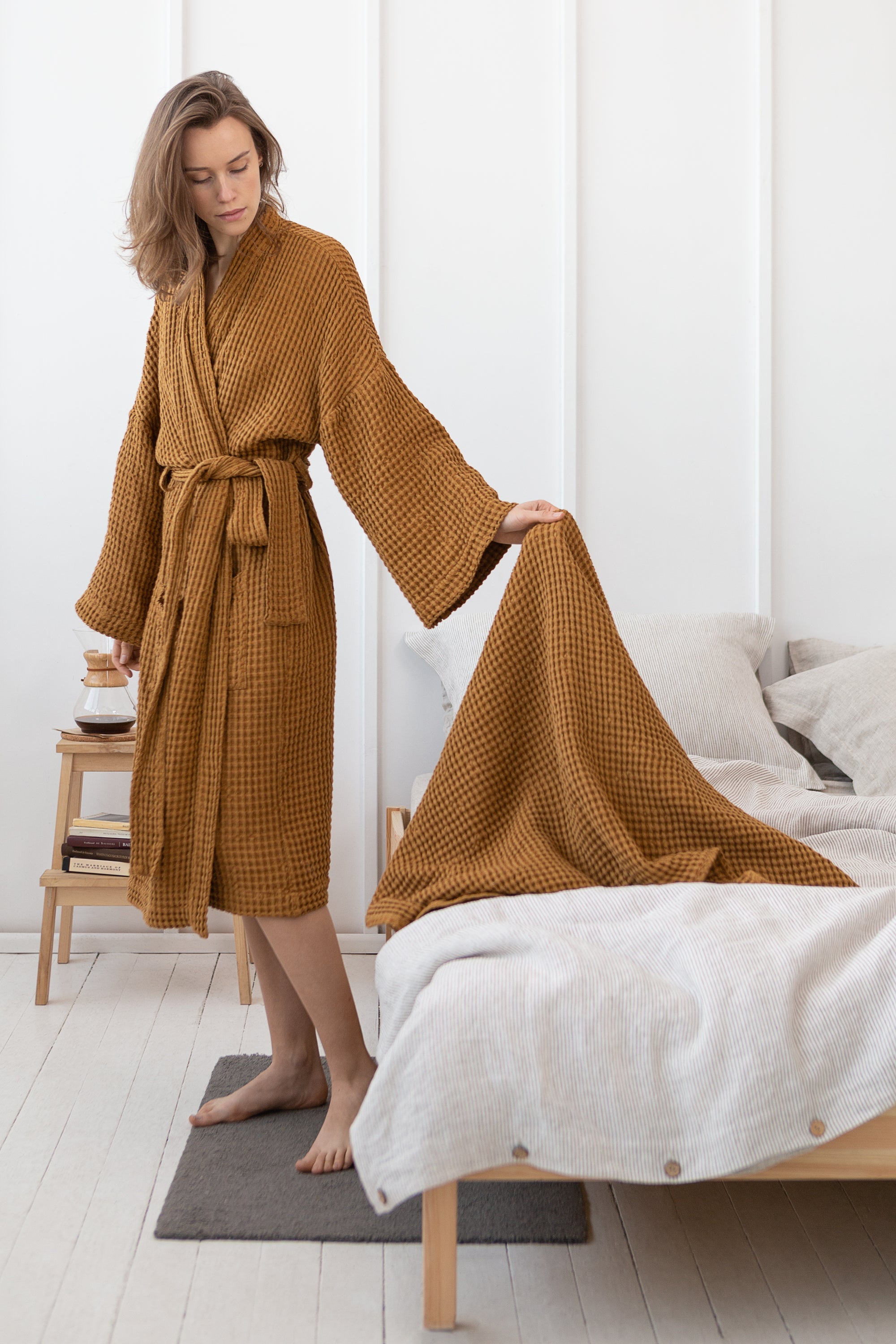 Set of linen waffle robes with towels